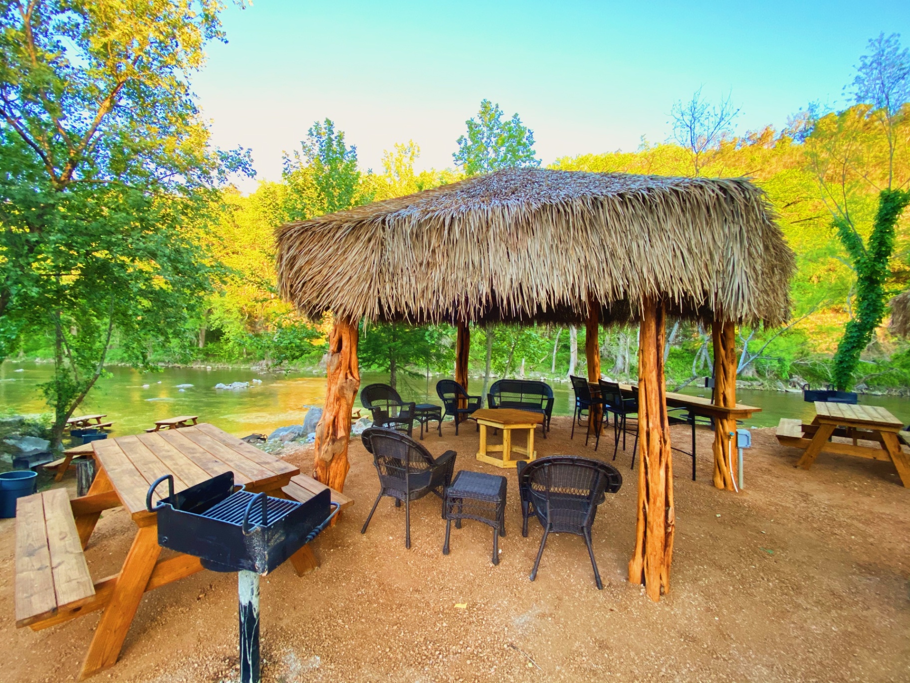 Cabana with grill and outdoor seating